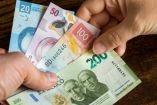Monex advierte presiones al peso por tasas altas de Banxico y Fed