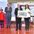 Homenaje a la fuerza laboral y planes de modernización.